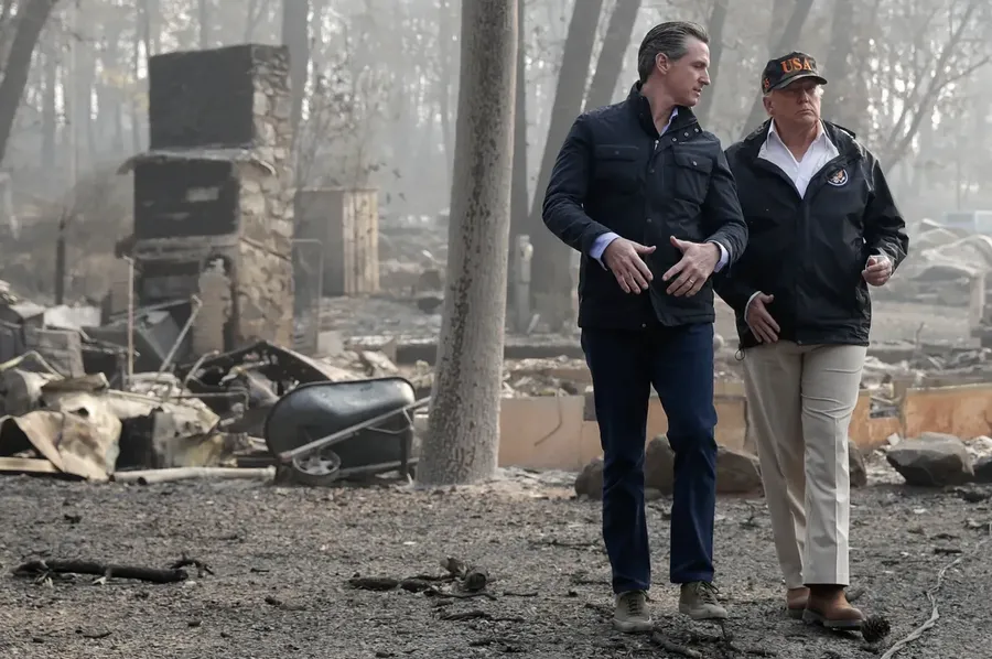 Then-President Donald Trump talks with Gov.-elect Gavin Newsom